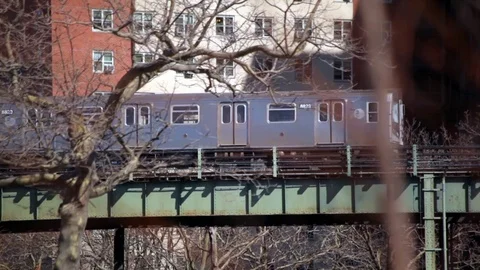 Elevated Train Passing Along Stock-Footage 75184809