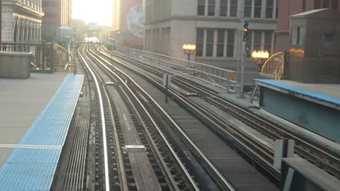 Elevated train passing between stations Stock Footage 91780746