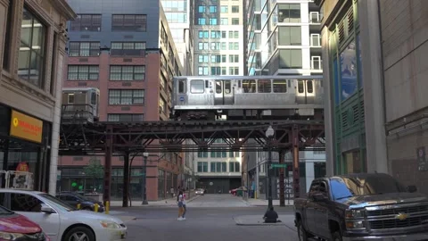 Elevated Train Passing Through Downtown Chicago Street Stock Footage 336261186
