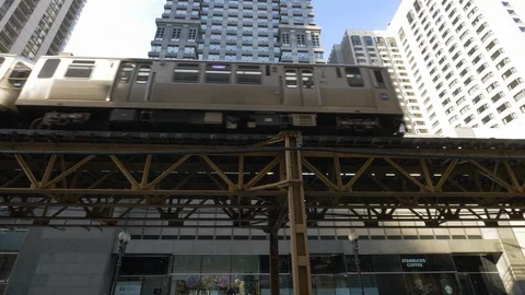 Elevated train rolling in Chicago Stock Footage 100701195