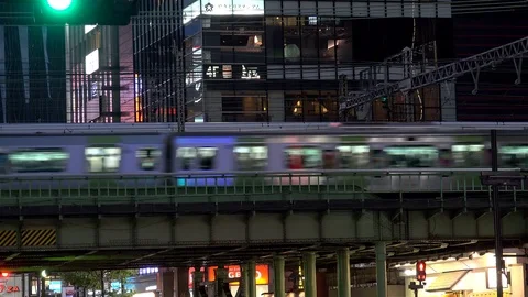Elevated train traffic (Shinkansen &amp; metro) at Ginza, Tokyo. Japan Stock Footage 102651207