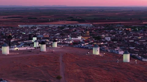 Elevated twilight view of historic windmills in Campo de Criptana, Spain Stock Footage 319538051