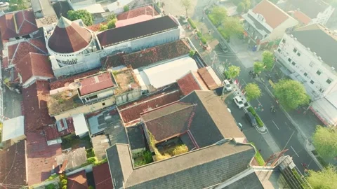 Elevated urban view toward historic Tugu Yogyakarta monument Video stock 342583085