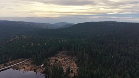 Elevated vantage revealing distant water body during twilight Stock Footage 320508674