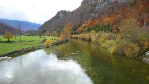 Elevated view of Alpine river flowing in beautiful autumn landscape Stock Footage 143346480