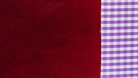 Elevated view chequered pattern textile plain burgundy fabric Stock Photos