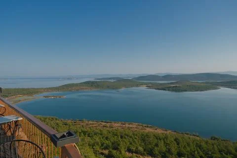 Elevated view of a coastal landscape featuring green islands and blue water Stock Photos