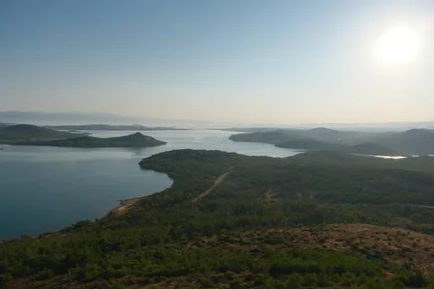 Elevated view of a coastal landscape featuring green islands and blue water Stock Photos