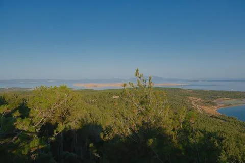Elevated view of a coastal landscape featuring green islands and blue water Stock Photos