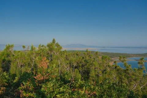 Elevated view of a coastal landscape featuring green islands and blue water Stock Photos