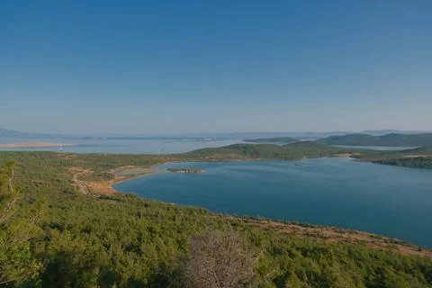 Elevated view of a coastal landscape featuring green islands and blue water Stock Photos
