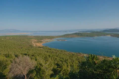 Elevated view of a coastal landscape featuring green islands and blue water Stock Photos