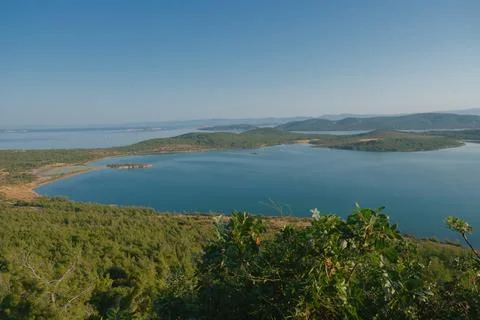 Elevated view of a coastal landscape featuring green islands and blue water Stock Photos