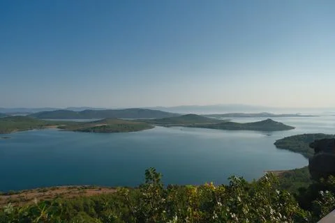 Elevated view of a coastal landscape featuring green islands and blue water Stock Photos