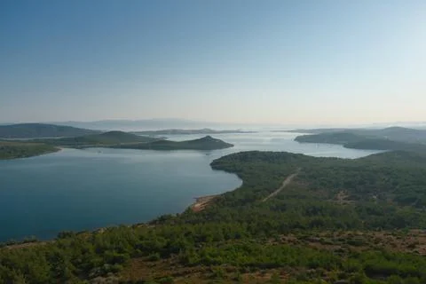 Elevated view of a coastal landscape featuring green islands and blue water Stock Photos
