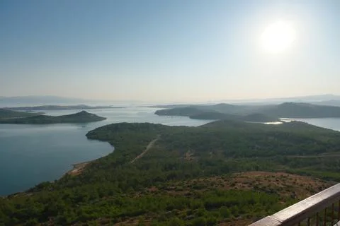 Elevated view of a coastal landscape featuring green islands and blue water Stock Photos