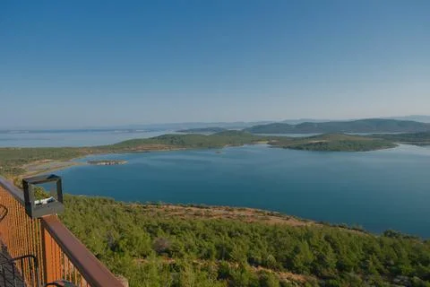 Elevated view of a coastal landscape featuring green islands and blue water Stock Photos