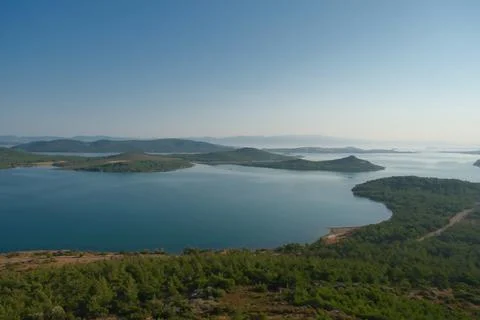 Elevated view of a coastal landscape featuring green islands and blue water Stock Photos