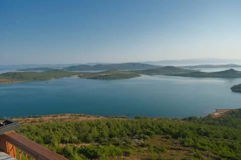 Elevated view of a coastal landscape featuring green islands and blue water Stock Photos