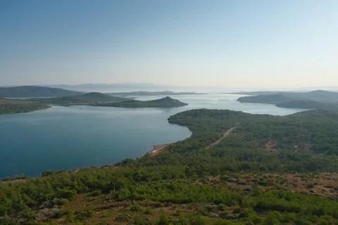 Elevated view of a coastal landscape featuring green islands and blue water Stock Photos