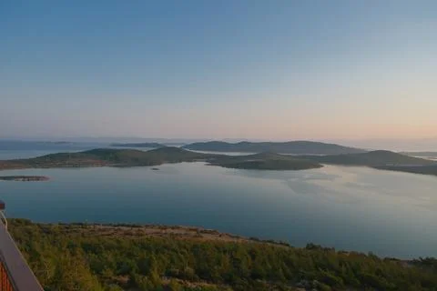 Elevated view of a coastal landscape featuring green islands and blue water Stock Photos