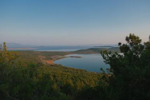 Elevated view of a coastal landscape featuring green islands and blue water Stock Photos