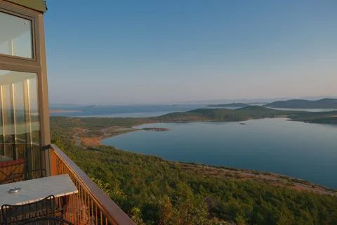 Elevated view of a coastal landscape featuring green islands and blue water Stock Photos