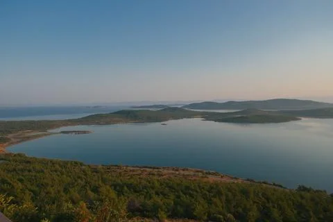 Elevated view of a coastal landscape featuring green islands and blue water Stock Photos