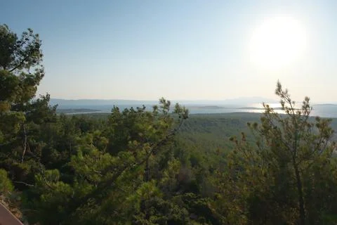 Elevated view of a coastal landscape featuring green islands and blue water Stock Photos