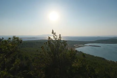 Elevated view of a coastal landscape featuring green islands and blue water Stock Photos