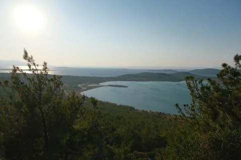 Elevated view of a coastal landscape featuring green islands and blue water Stock Photos