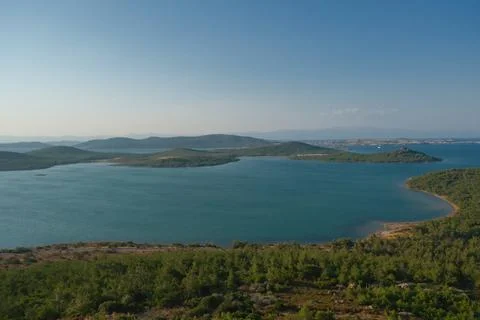 Elevated view of a coastal landscape featuring green islands and blue water Stock Photos