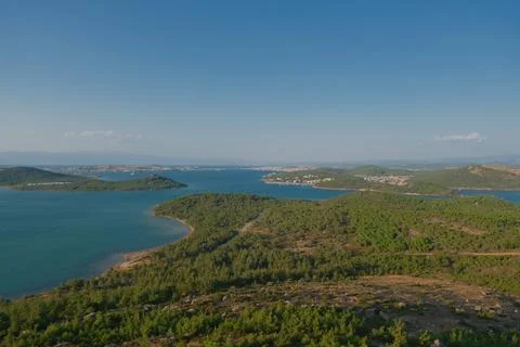 Elevated view of a coastal landscape featuring green islands and blue water Stock Photos