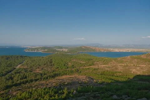 Elevated view of a coastal landscape featuring green islands and blue water Stock Photos