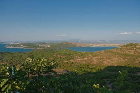 Elevated view of a coastal landscape featuring green islands and blue water Stock Photos