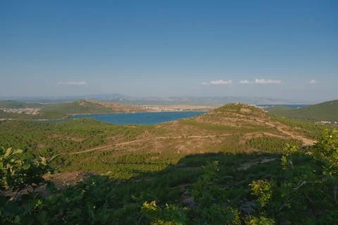 Elevated view of a coastal landscape featuring green islands and blue water Stock Photos