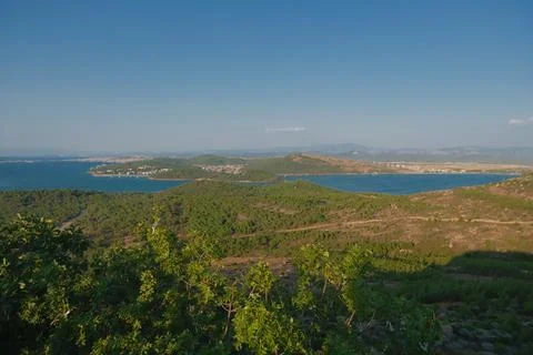 Elevated view of a coastal landscape featuring green islands and blue water Stock Photos