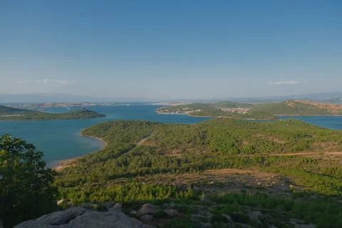 Elevated view of a coastal landscape featuring green islands and blue water Stock Photos