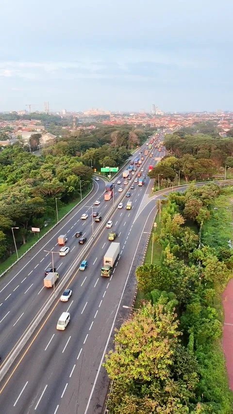 Elevated view of a congested multi-lane highway with heavy vehicle traffic Stock Footage 335219145