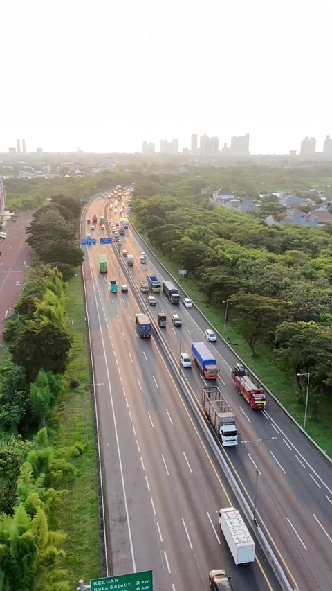 Elevated view of a congested multi-lane highway with heavy vehicle traffic Stock Footage 335219160