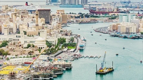 Elevated view of  Deira district in Dubai, UAE with harbor and boats. Stock Footage 94528797