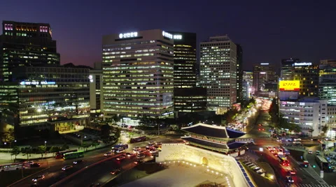 Elevated View of Early Evening Traffic at Namdaemun Gate in Time Lapse Video stock 61630531