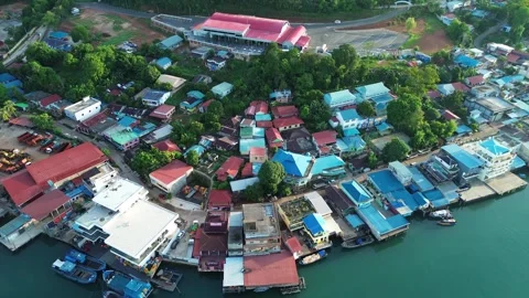 Elevated View of an Expansive Archipelago Settlement Vibrant Structures Hug.. Stock-Footage 337282853