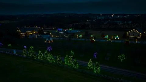 Elevated View Of A Festive Display With Two Houses Adorned In Christmas Light Stock Photos