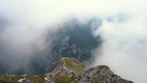 Elevated view of fog moving on the hilltop Stock Footage 210534865