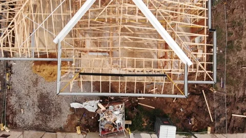 Elevated View of House Building Site and Timber House Frame Aerial 4K Stock Footage 139122998