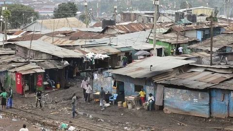 Elevated view of Kibera slum and residents, Nairobi, Kenya Stock Footage 79546500