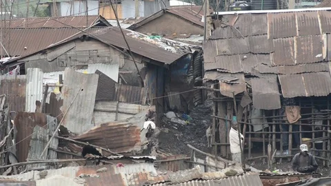 Elevated view of Kibera slum and residents, Nairobi, Kenya Stock Footage 79546838