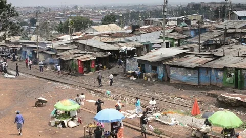 Elevated view of Kibera slum and residents, Nairobi, Kenya Stock Footage 79547066
