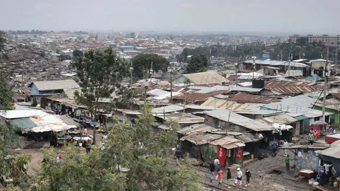Elevated view of Kibera slum with people and shacks, Nairobi, Kenya Stock Footage 79545948